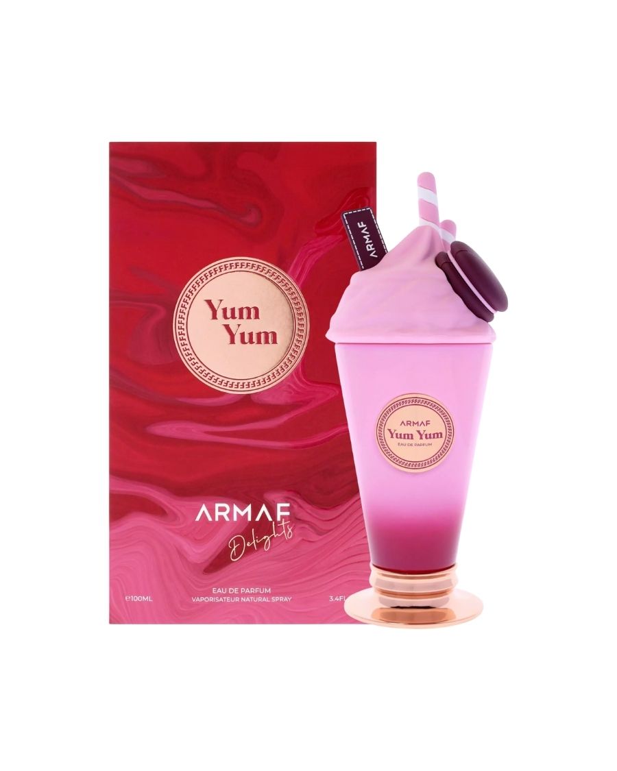 Perfume Armaf Yum Yum Delight 100 ml EDP en frasco con diseño de malteada en tonos pastel y detalles decorativos modernos.