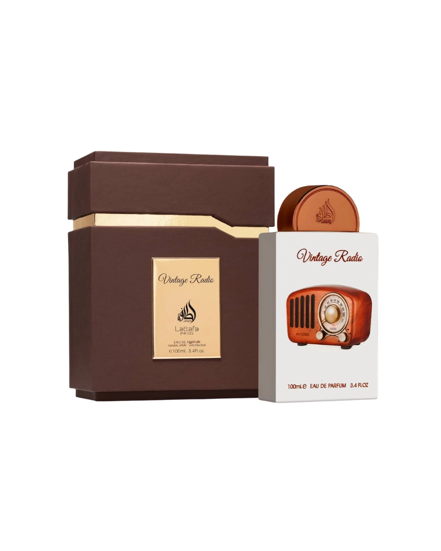 Perfume Lattafa Vintage Radio de 100 ml con frasco blanco, ilustración de radio antigua y caja marrón de lujo.