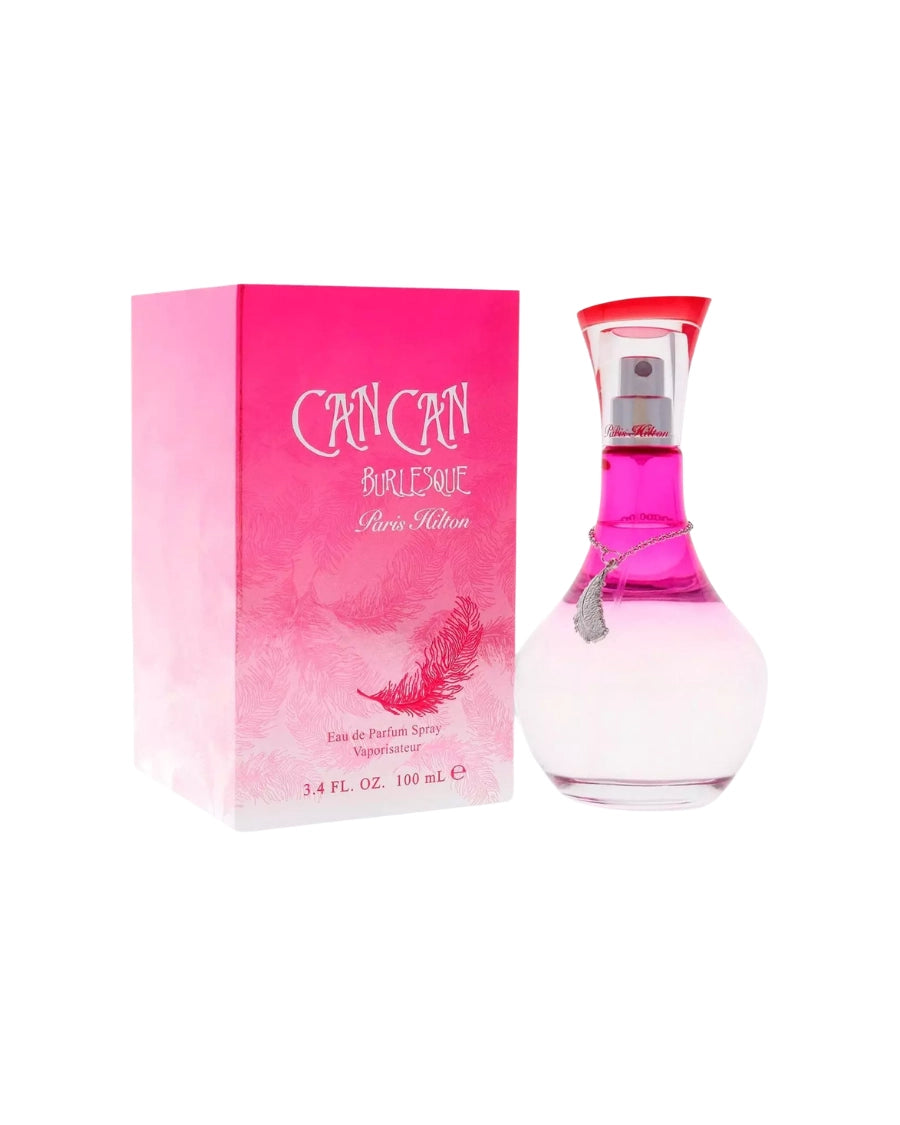 Perfume Can Can Burlesque de Paris Hilton con frasco degradado rosa, dije de pluma plateada y caja fucsia vibrante.